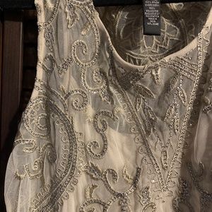 Sequin and beaded tank top.